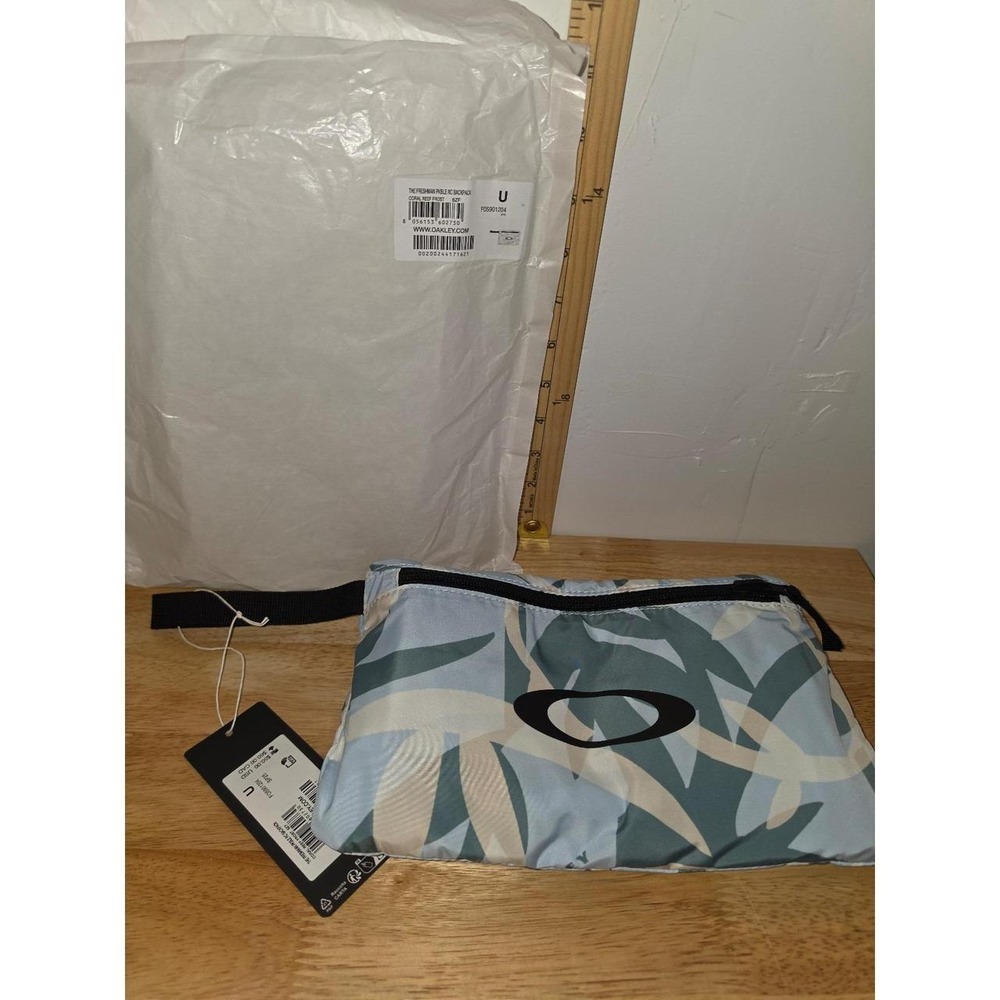 NWT Oakley The Freshman Packable RC Backpack packed into its built-in front stor